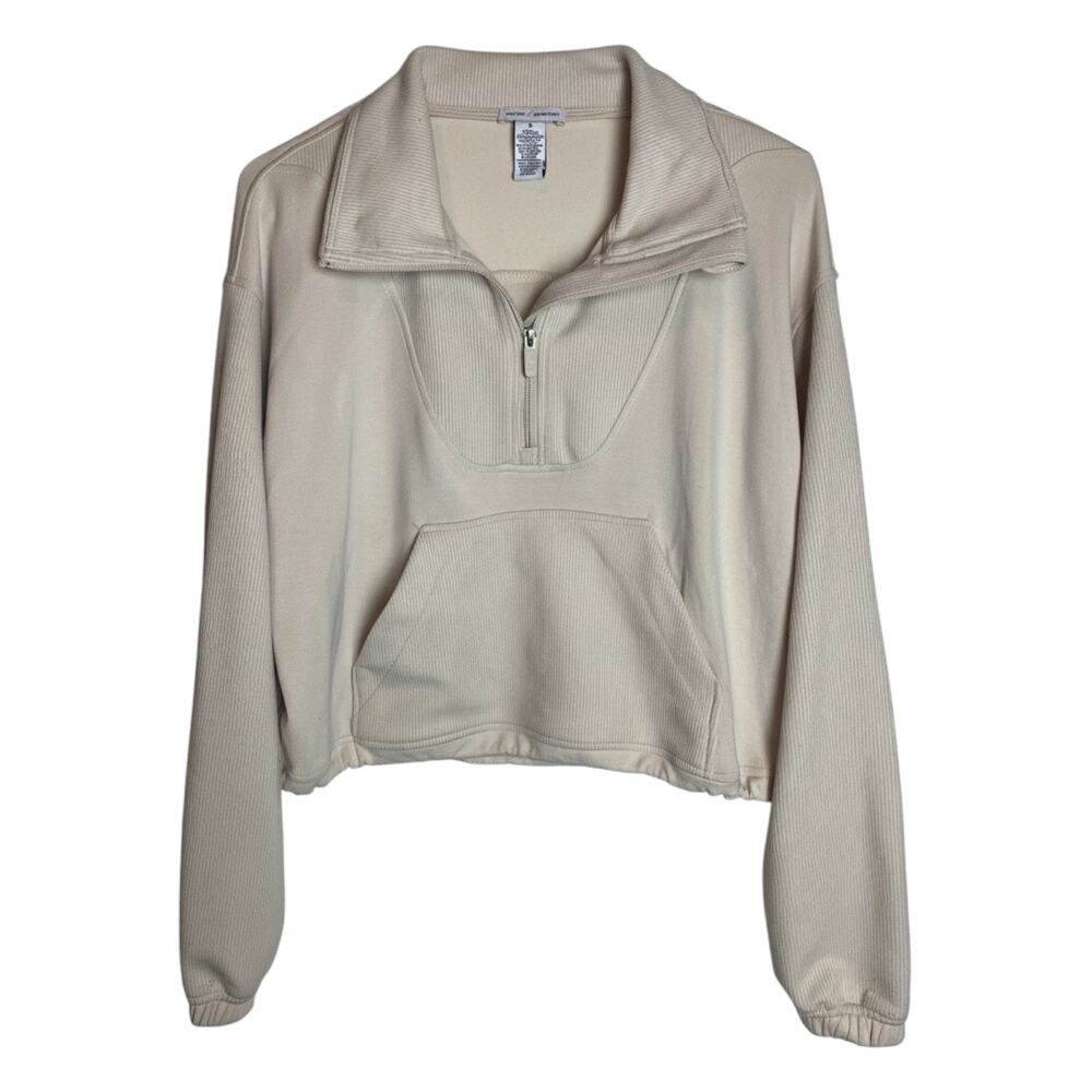 Cream cropped quarter-zip sweater and matching shorts